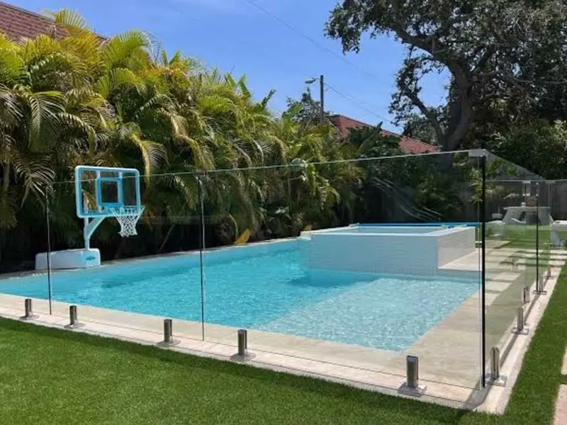 Modern backyard glass fence panels to secure outdoor garden areas while keeping views open.Islands