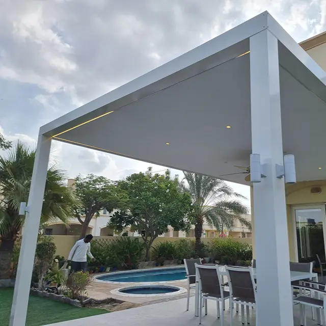 Modern insulated close roof aluminium pergola providing 100% heat block and UV protection for a villa patio.