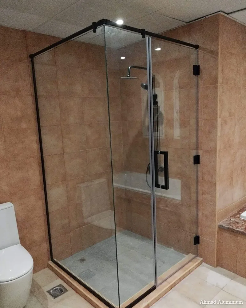 Modern black grid industrial style glass shower screen for contemporary bathrooms.