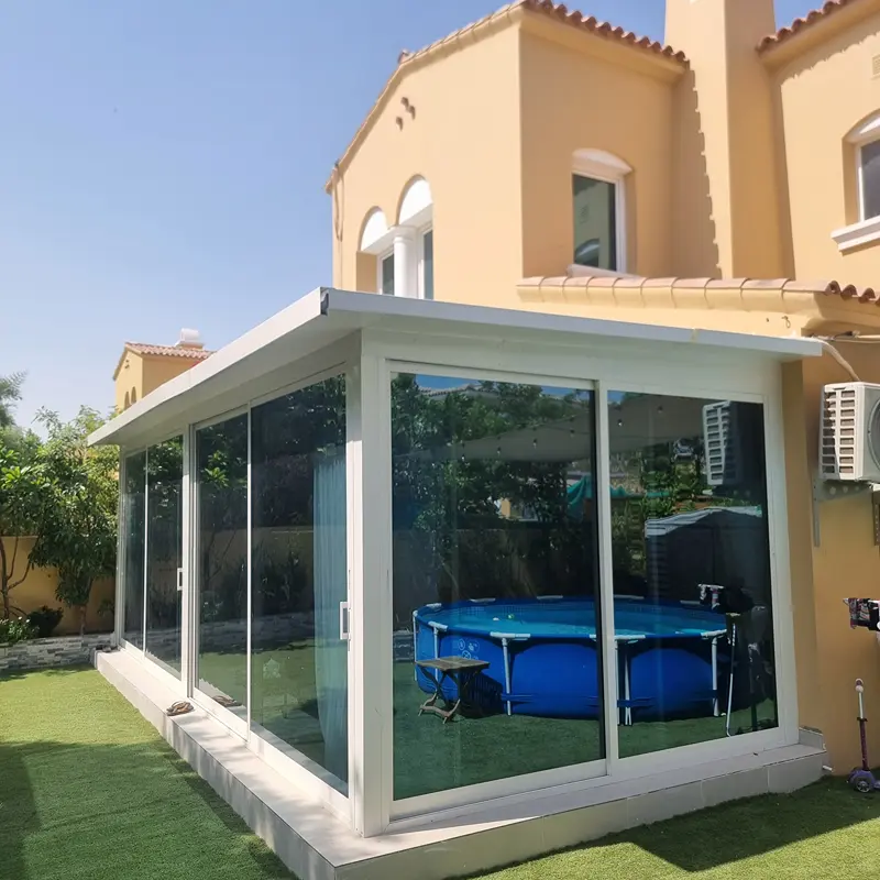 Contemporary glass extension adding value and an elegant connection between indoor and outdoor areas.