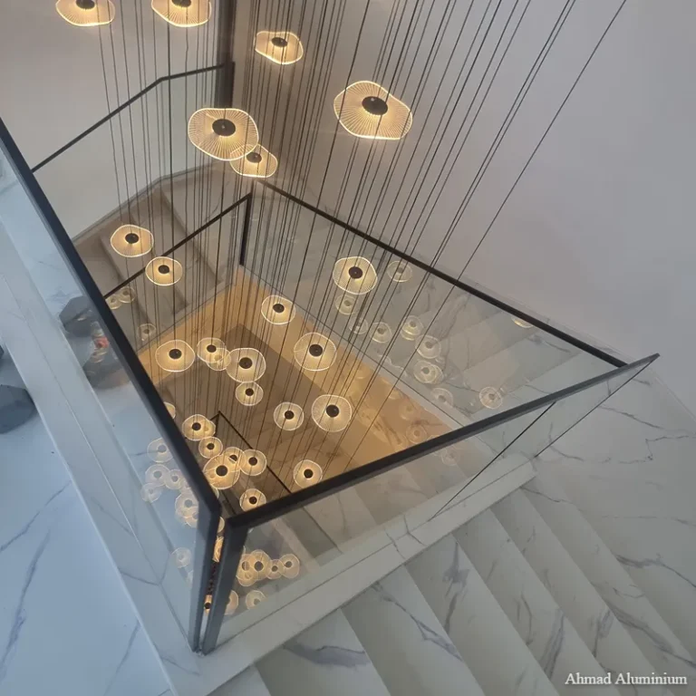 Curved glass staircase railing sharjah.webp