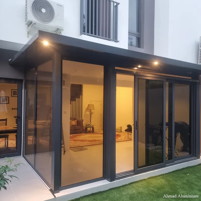 Combined villa extension for kitchen and maid's room with integrated AC and high-quality sliding doors.