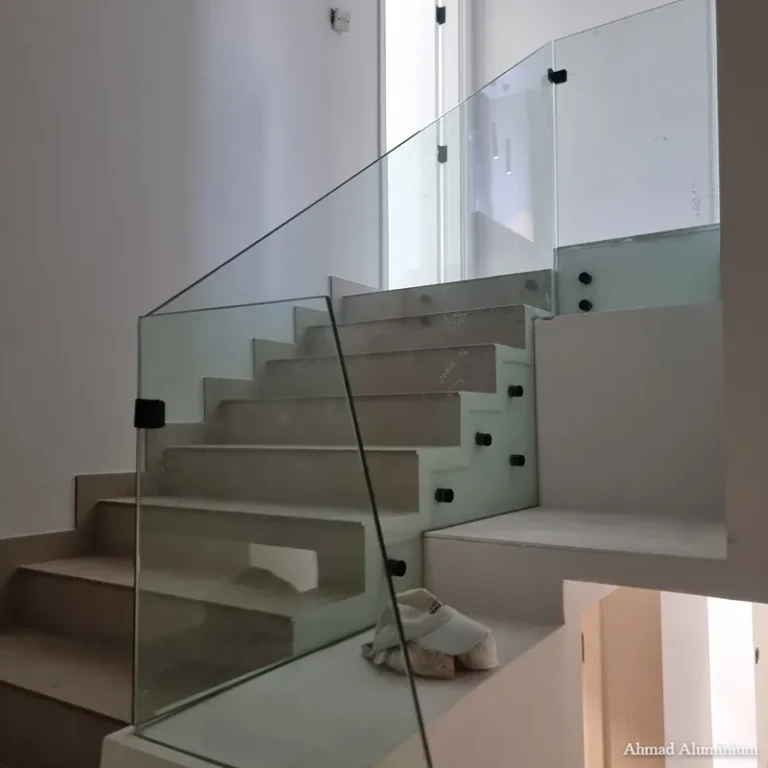 Frameless glass stair railing dubai.webp
