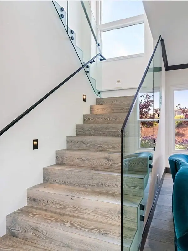 Professional glass railing accessories including brackets, handrails, and finishing profiles.