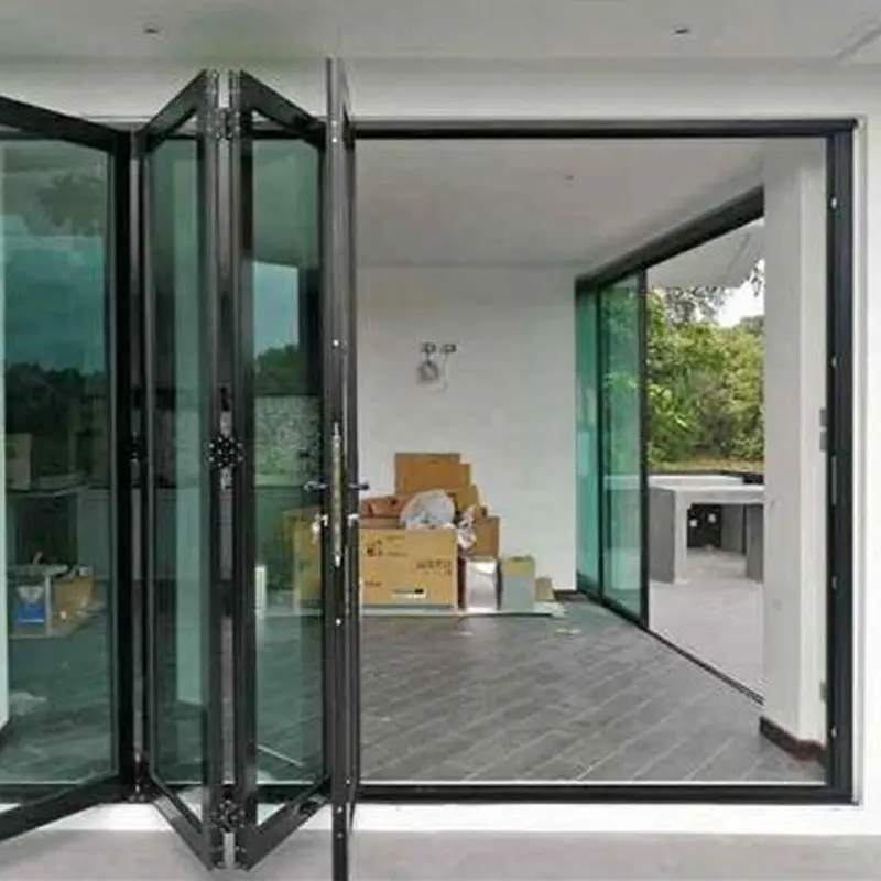 Premium grade aluminium bifold doors with high-end hardware for luxury villa interiors.