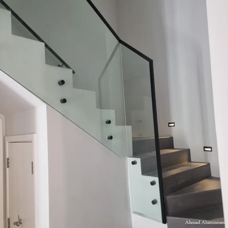 Matte black glass stair brackets.webp