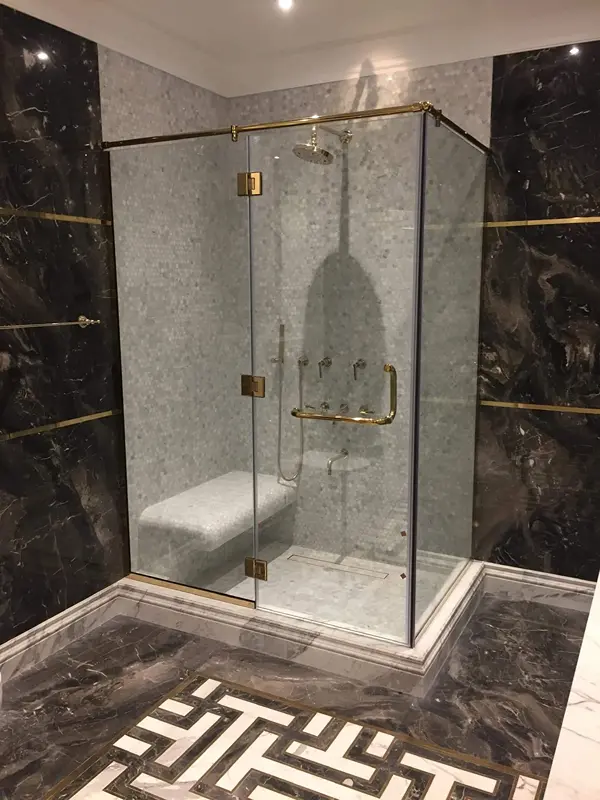 Sandblasted frosted privacy glass for bathroom shower partitions.