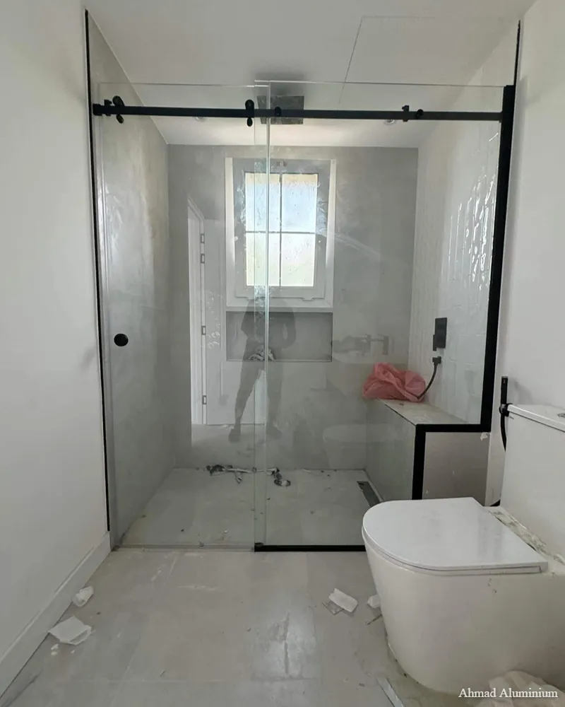 Sandblasted frosted privacy glass panel for bathroom shower partitions.