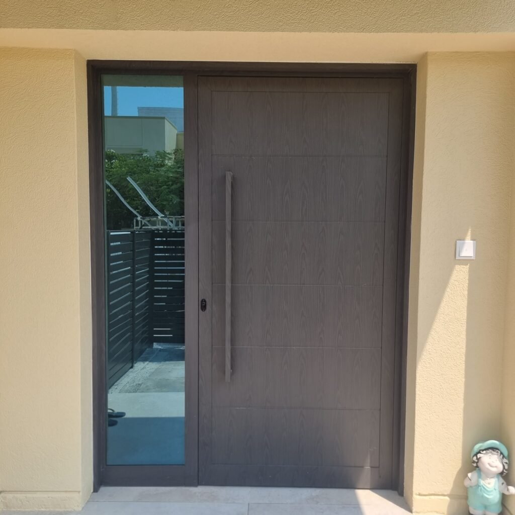 Premium heat-resistant powder coated black aluminium main entrance door designed for Dubai summers