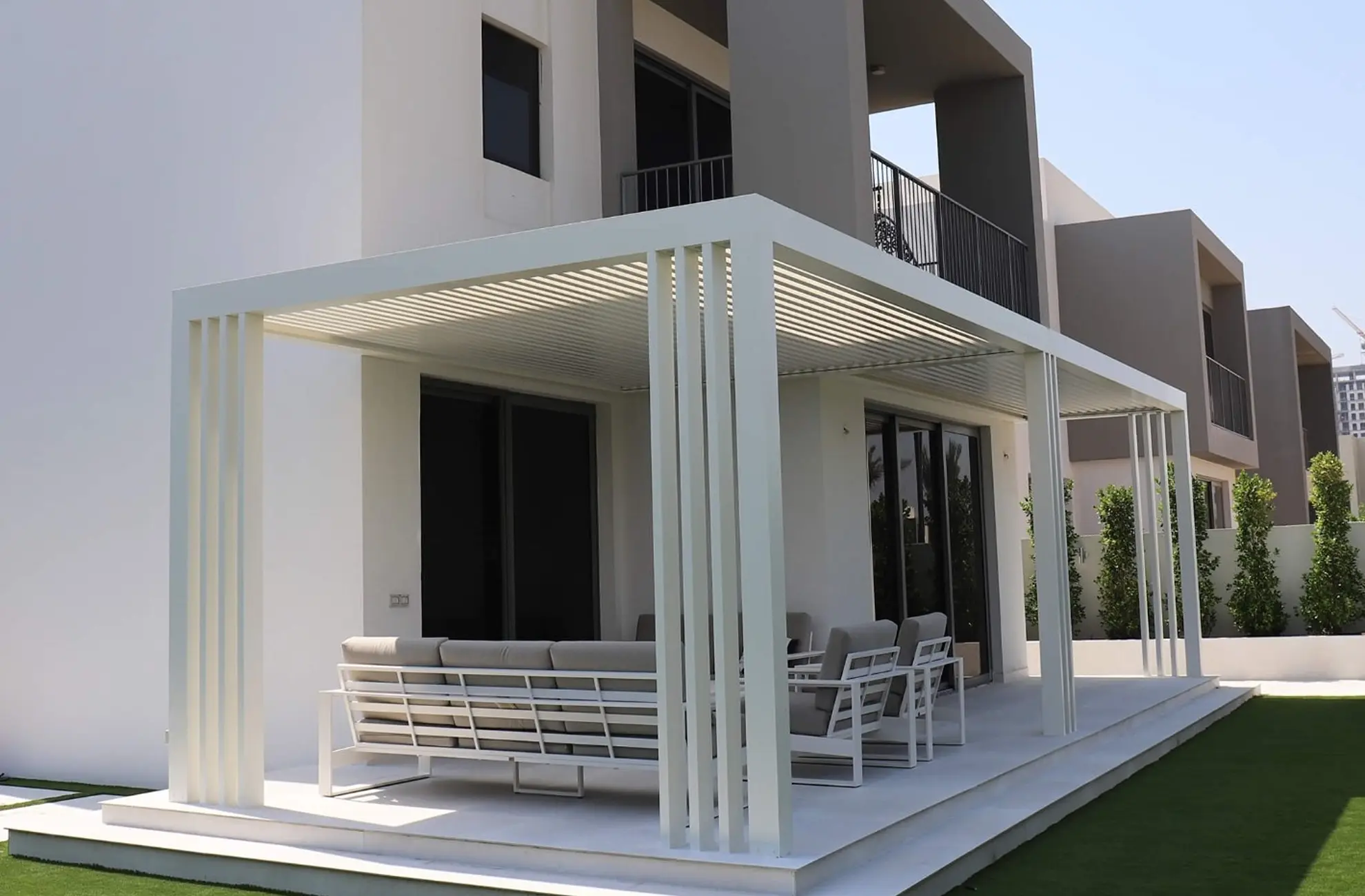 Modern white outdoor aluminium pergola.webp