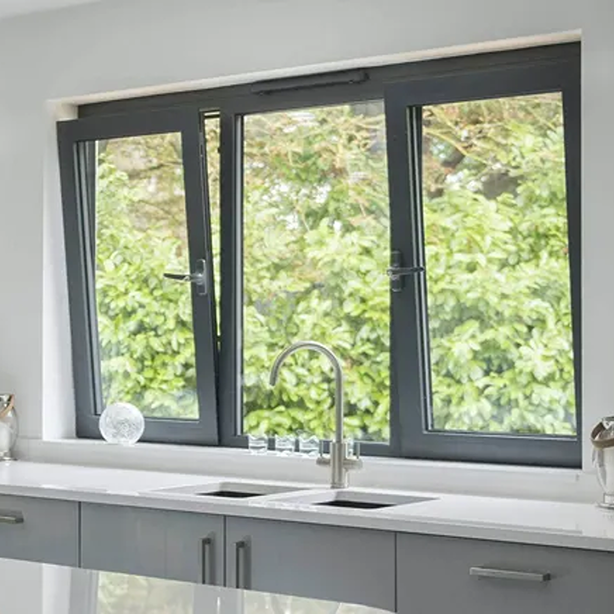 Black powder-coated aluminium casement window with premium airtight rubber seals.
