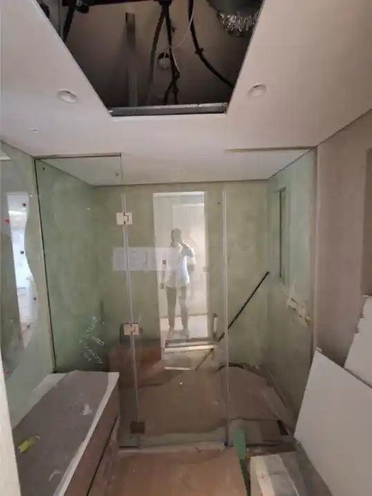 Custom 10mm tempered shower glass installation Emirates Living