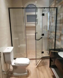 Frameless shower glass partition matte black fittings dubai marina ahmad aluminium
